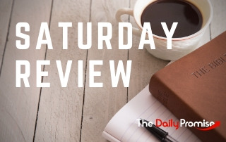 Saturday Review - Coffee cup, Bible and pen on a wooden table
