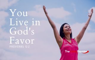 Woman with hands raised - You Live in God's Favor - Proverbs 12:2