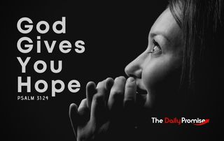 Woman praying with black background - God Gives You Hope, Psalm 31:24