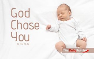 Baby dressed in white. "God Chose You" John 15:16