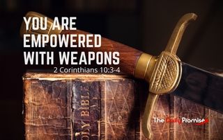 Bible with sword laying across it. "You are Empowered with Spiritual Weapons" - 2 Corinthians 10:3-4