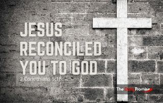 Cross on gray brink wall - Jesus Reconciled You to God - 2 Corinthians 5:18