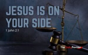 Scales of justice with a naval. "Jesus is on Your Side" - 1 John 2:1