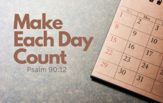 A calendar laying in the corner with the words "Make Each Day Count"