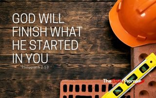 Construction items lying on wood background. God Will Finish What He Started in You - Philippians 1:6