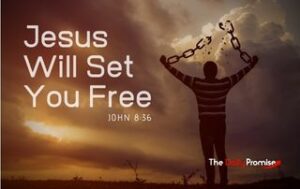 Man with broken chains above his head. - "Jesus Will Set You Free"