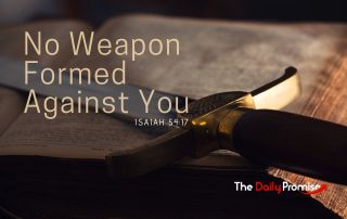 Sword laying across a Bible. "No Weapon Formed Against You" Isaiah 74:17