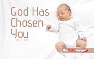 Baby dressed in white. "God Has Chosen You" John 15:16