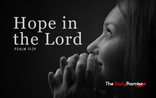 Woman praying with black background - Hope in the Lord - Psalm 31:24