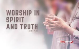 A Person with their hand raised in worship. "Worship in Spirit and Truth"