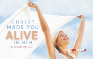 Woman with Hands raised hold a sheet in the wind - "Christ Made You Alive in Him - 1 Corinthians 15:22