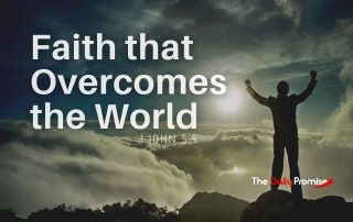 A man standing on a mountain with his hands raised. "Faith that Overcomes the World". 1 John 5:4