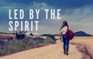 A young woman walking down a road. "Led by the Holy Spirit - Romans 8:14