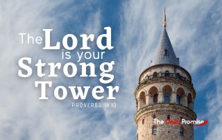 God is Your strong tower with a tower and blue sky in the background.