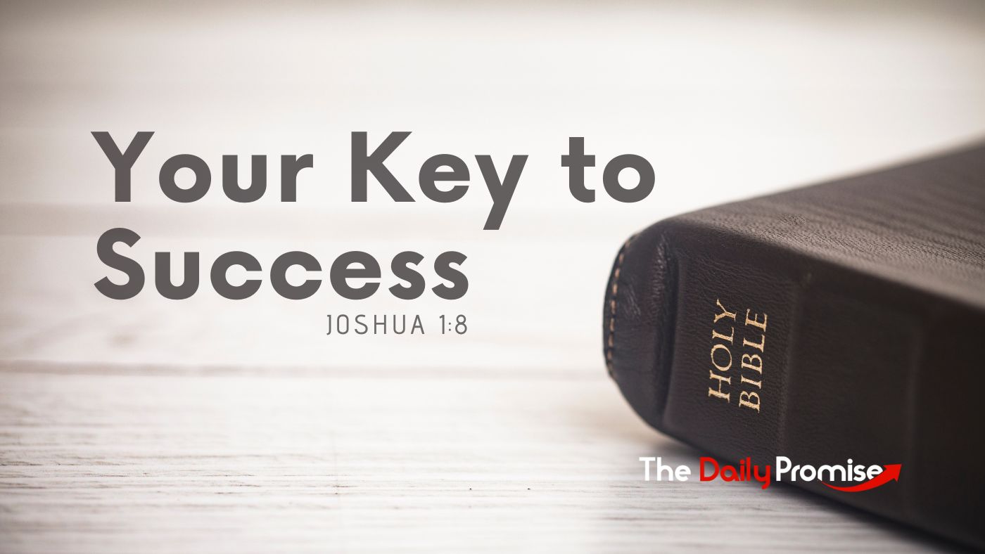 A black Bible laying on light gray wood. "Your Key to Success" is the title