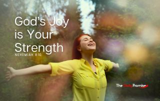 Woman in the woods with hands raised - "God's Joy is Your Strength" - Nehemiah 8:10