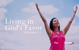 A Woman with hands raised against a blue sky with clouds. - Living in God's Favor" - Proverbs 12:2