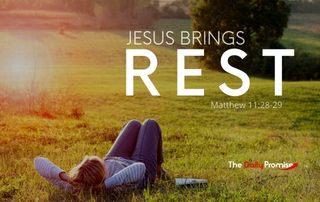 A person is lying in the grass with the words "Jesus Brings Rest."