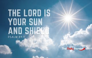 A blue sky with scattered clouds and the sun shining through. "The Lord is Your Sun and Shield. - Psalm 84:11