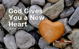 Gray rocks with a brown heart shaped rock in the center. "God Gives You a New Heart"