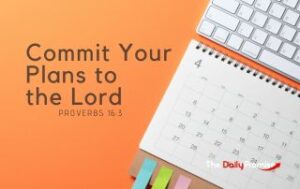 A calendar on an orange background with the words "Commit Your Plans to the Lord" - Proverbs 16:3