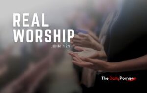 A person with their hands raised in worship. "Real Worship" - John 4:24