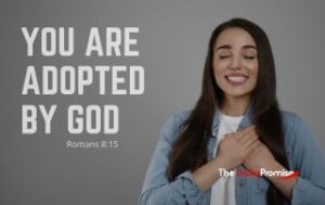 A grateful woman with hands on her chest. "You Are Adopted by God" - Romans 8:15