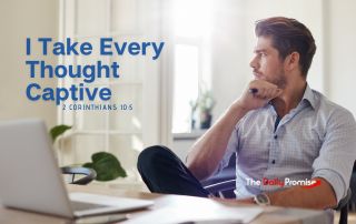 A man sitting at a table thinking. - "I Take Every Thought Captive" - 2 Corinthians 10:5