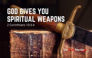 Bible with sword laying across it. "God Gives You Spiritual Weapons" - 2 Corinthians 10:3-4