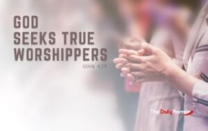 A closeup of a woman worshiping God with her hands raised. "God Seeks True Worshippers." John 3:23