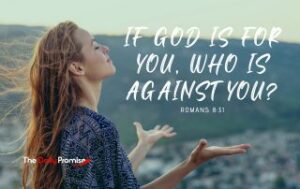 A woman with hands raised in prayer, "If God is for You, Who is Against You?" - Romans 8:31