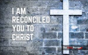 A cross on gray brink wall - I Am Reconciled to Christ - 2 Corinthians 5:18