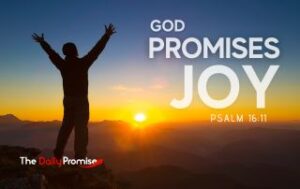 A man standing in front of a sunrise with his hands raised. "God Promises Joy" Psalm 16:11