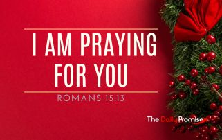 A red background with holly on the right side. "I Am Praying for You" Romans 15:13