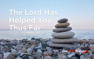 A stack of flat, smooth stones stacked along the water. "The Lord Has Helped You Thus Far" 1 Samuel 7:12