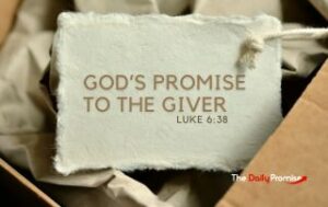 Torn paper with the words - "God's Promise to the Giver" Luke 6:38