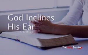 A man with hands folded on top of an open Bible, "God Inclines His Ear."