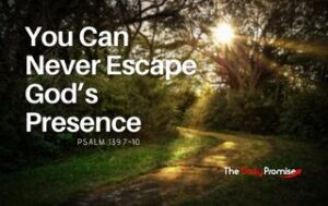 A wooded area with a dirt path running through it. The sun is peaking through the leaves. "You Can Never Escape God's Presence"
