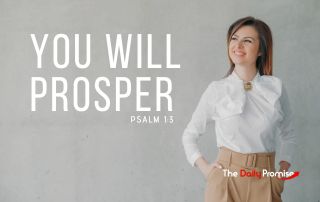 A young woman standing with her hands on her hips. "You Will Prosper." - Psalm 1:3