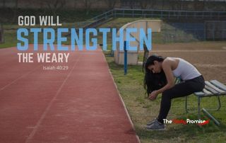 A person is sitting on a bench by an athletic track. She had her head down. "God Will Strengthen the Weary."