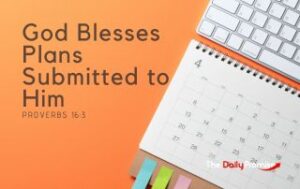 A calendar on an orange background with the words "God Blesses Plans Submitted to Him" - Proverbs 16:3