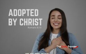 A grateful woman with her hands on her chest. "Adopted by God" - Romans 8:15