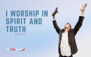 A man is standing with his hands raised in worship in front of light blue faded background. "I Worship in Spirit and Truth."