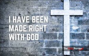 A cross on gray brick wall - I Have Been Made Right With God - 2 Corinthians 5:18