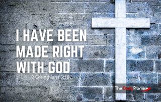 A cross on gray brick wall - I Have Been Made Right With God - 2 Corinthians 5:18