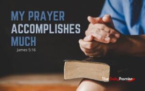 A man with folded hands on the Bible - "My Prayer Accomplishes Much" - James 5:16