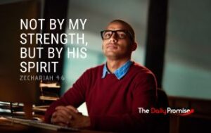 A man in a burgundy sweater looking up. "Not by My Strength, but by His Spirit"