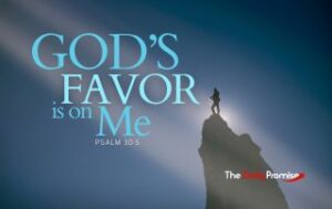 A man standing on the top of a mountain with the light shining on him. "God's Favor is on Me" - Psalm 30:5