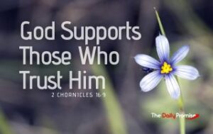 A blooming white and blue flower with the words "God Supports Those Who Trust Him" in the foreground.
