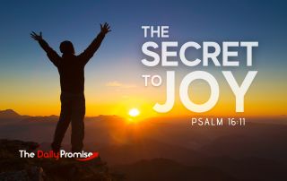 A man standing in front of a sunrise with his hands raised. "The Secret to Joy" Psalm 16:11